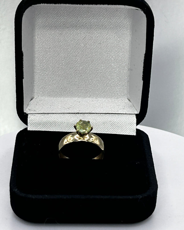 1.0 carat unheated Montana Sapphire yellow/green color change 14k gold solitaire setting