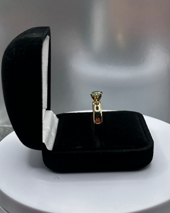 1.0 carat unheated Montana Sapphire yellow/green color change 14k gold solitaire setting
